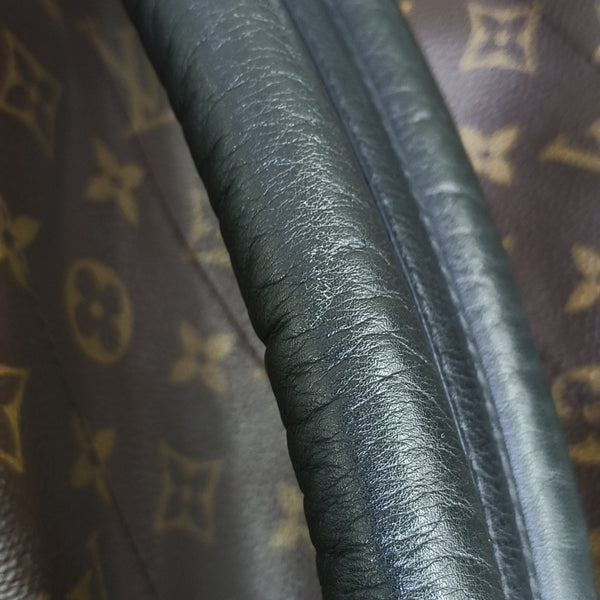 Monogram Coated Canvas Backpack Brown