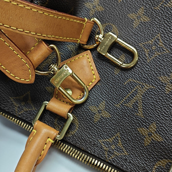 SPEEDY 25 Monogram Coated Canvas Brown