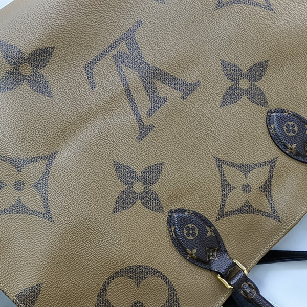 ONTHEGO GM Monogram Coated Canvas Brown