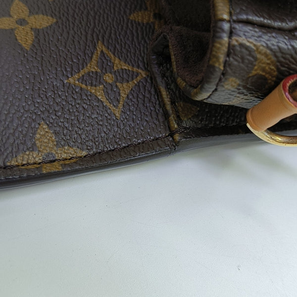 MÉTIS EAST WEST Monogram Coated Canvas Brown