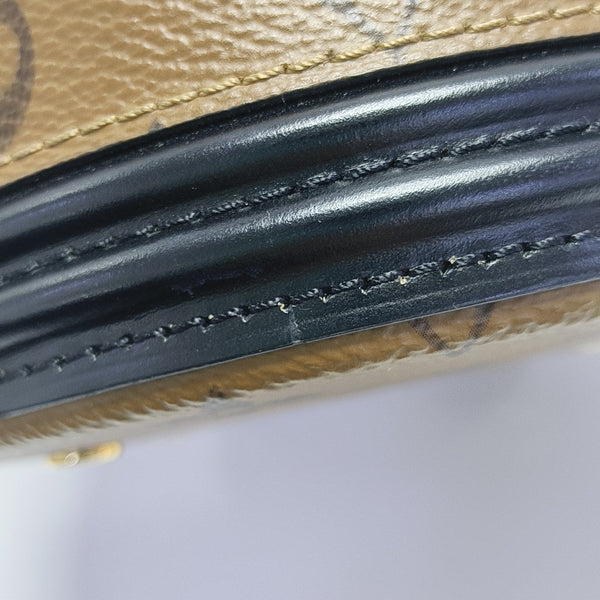 CANNES PM Monogram Coated Canvas Brown