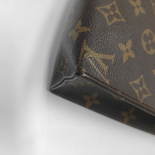 TOILET POCKET 19 Monogram Coated Canvas Brown