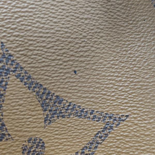 ONTHEGO MM Monogram Coated Canvas Brown