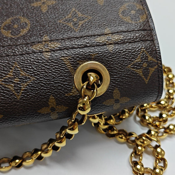 VICTOIRE Monogram Coated Canvas Brown