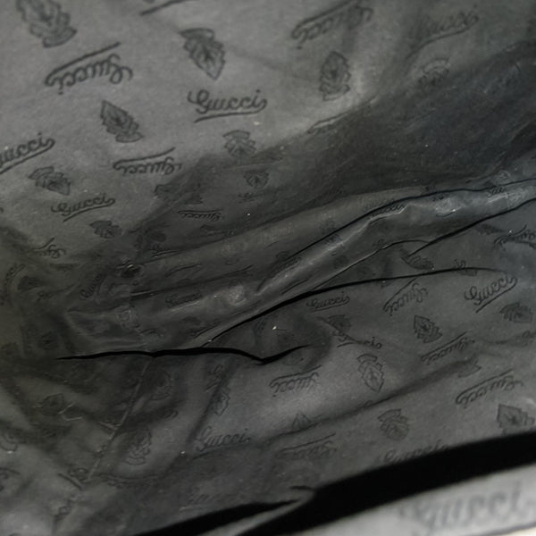 Monogram Coated Canvas Backpack Black