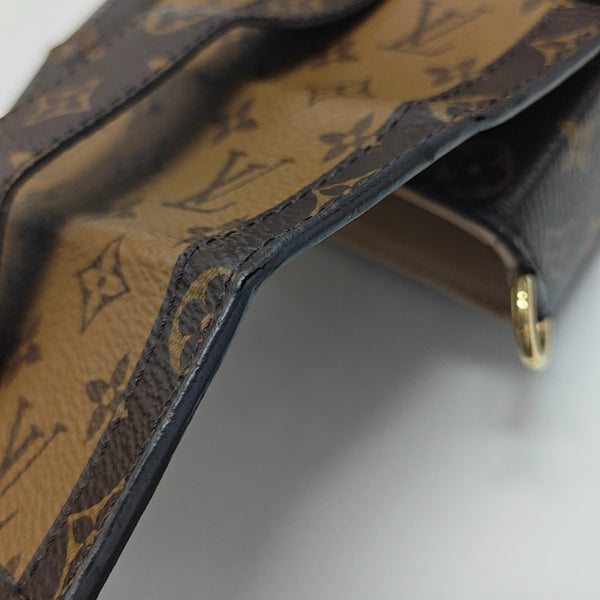 TRUNK Monogram Coated Canvas Brown