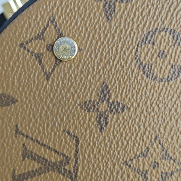 CANNES PM Monogram Coated Canvas Brown