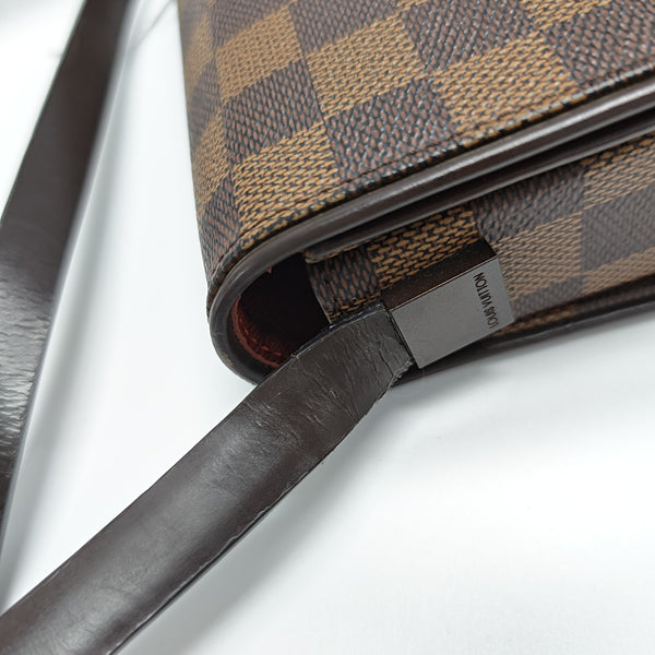 TRIBECA Damier Ebene Coated Canvas Brown
