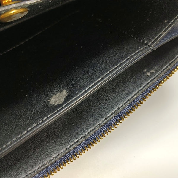 Authenticated pre-owned TRIO Calfskin Black - Clutch at Looply