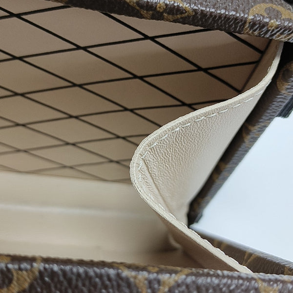 PETITE MALLE Monogram Coated Canvas Brown