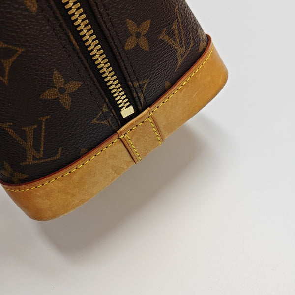 ALMA PM Monogram Coated Canvas Brown