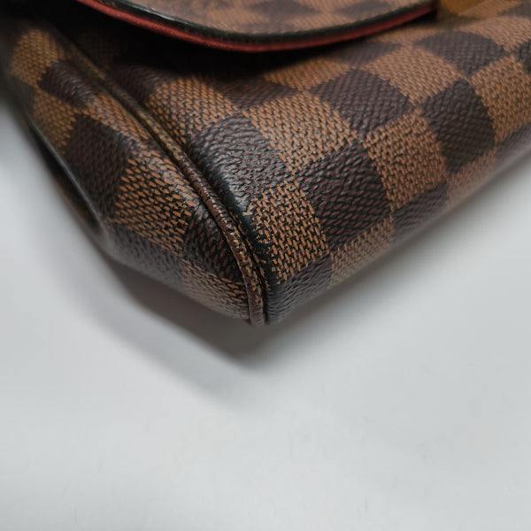 FAVORITE MM Damier Ebene Coated Canvas Brown