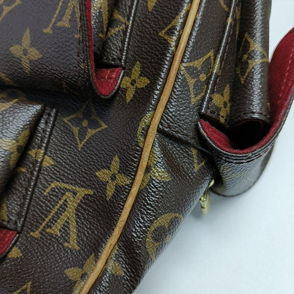 EXCENTRI-CITE Monogram Coated Canvas Brown