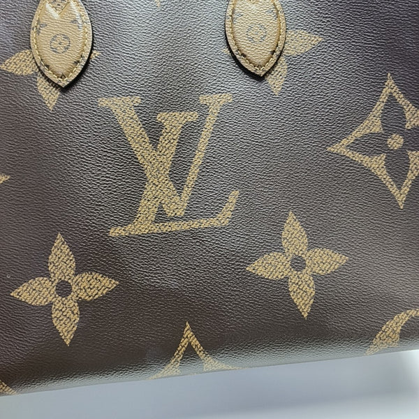 ONTHEGO MM Monogram Coated Canvas Brown