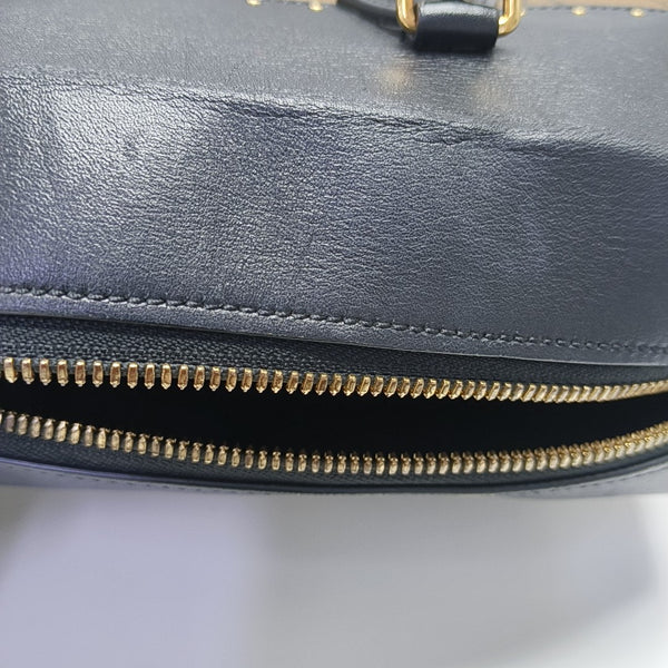 PETITE MALLE Monogram Coated Canvas Brown