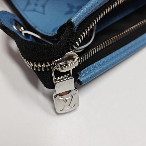 Pochette Voyag MM Monogram Coated Canvas Blue