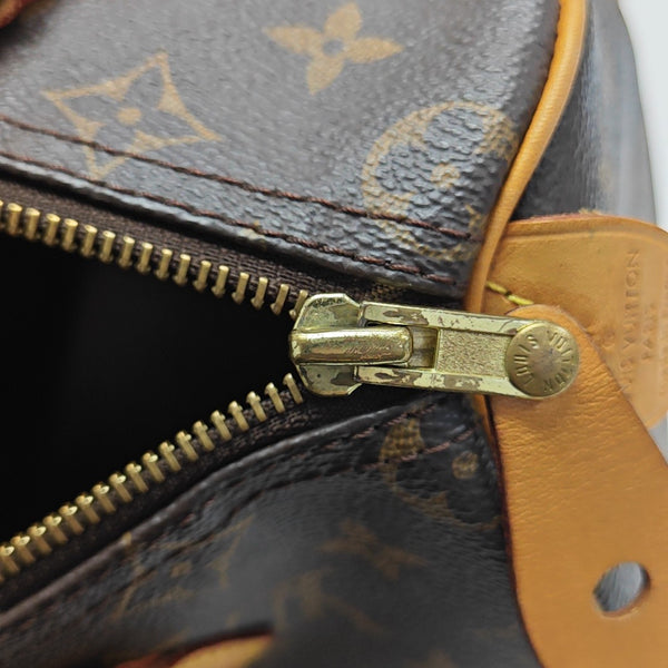 SPEEDY 25 Monogram Coated Canvas Brown
