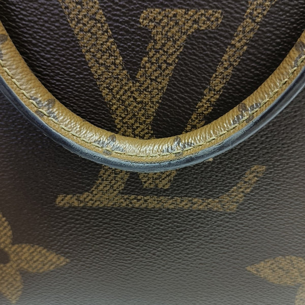 ONTHEGO MM Monogram Coated Canvas Brown