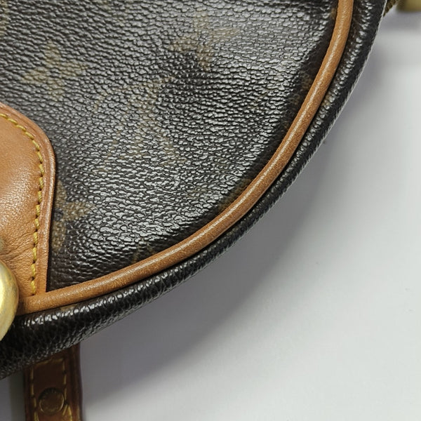 MONTORGUEI Monogram Coated Canvas Brown