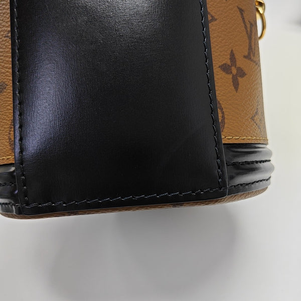 CANNES PM Monogram Coated Canvas Brown