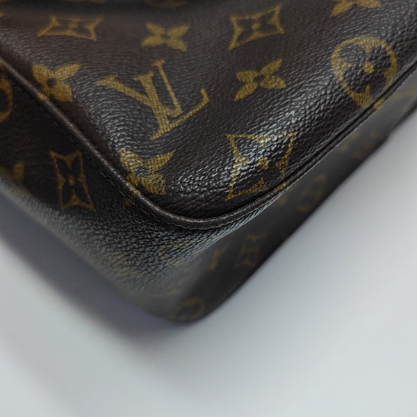 LOOPING GM Monogram Coated Canvas Brown