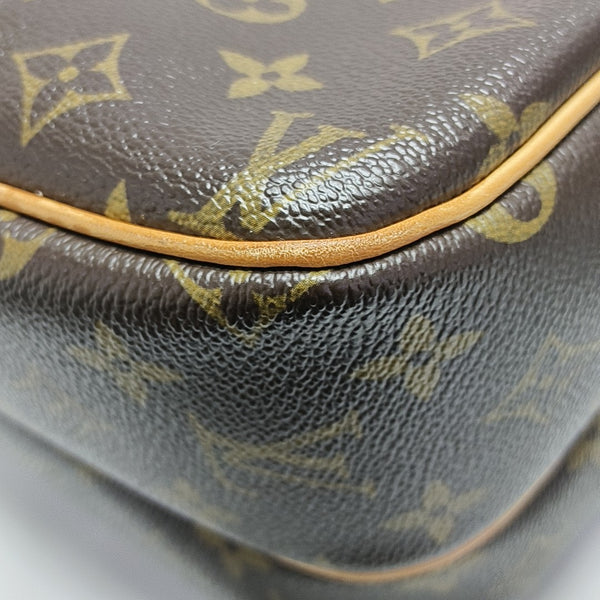 REPORTER PM Monogram Coated Canvas Brown