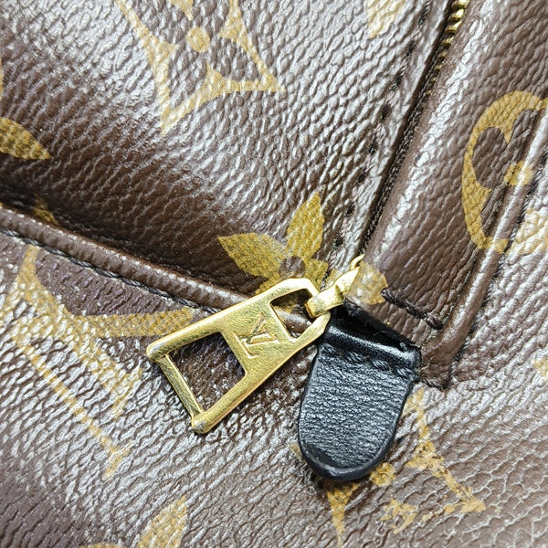 Monogram Coated Canvas Backpack Brown
