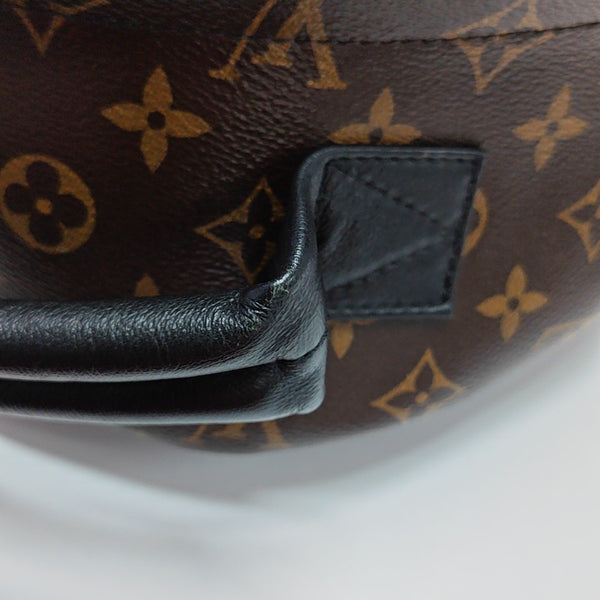 Monogram Coated Canvas Backpack Brown