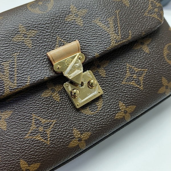 MADELEINE Monogram Coated Canvas Brown