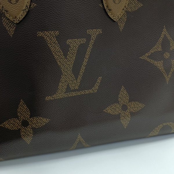 ONTHEGO MM Monogram Coated Canvas Brown