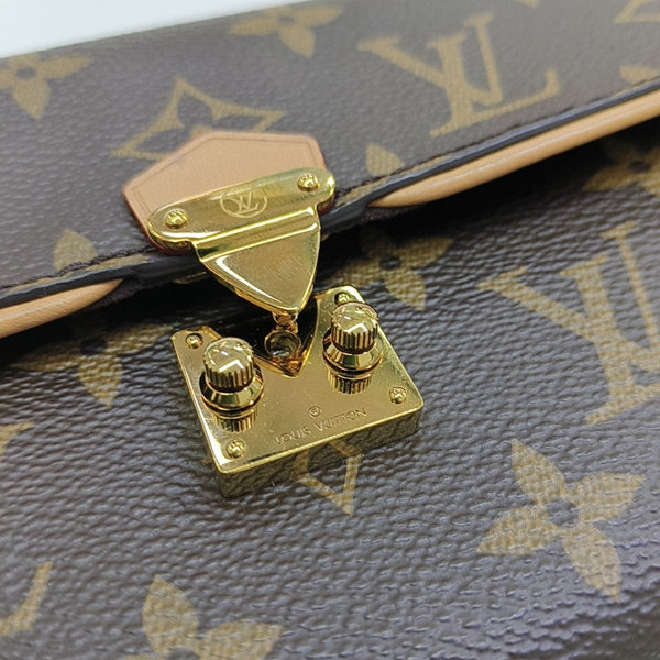 Pochette Camille Monogram Coated Canvas Brown