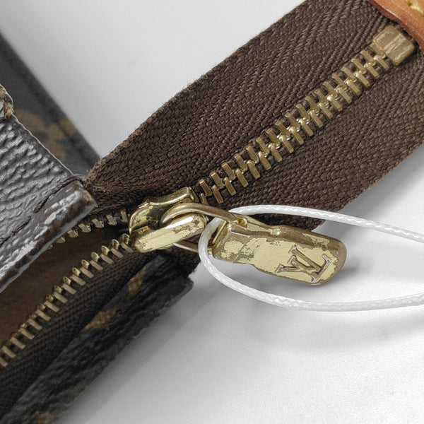 TOILET POCKET 26 Monogram Coated Canvas Brown