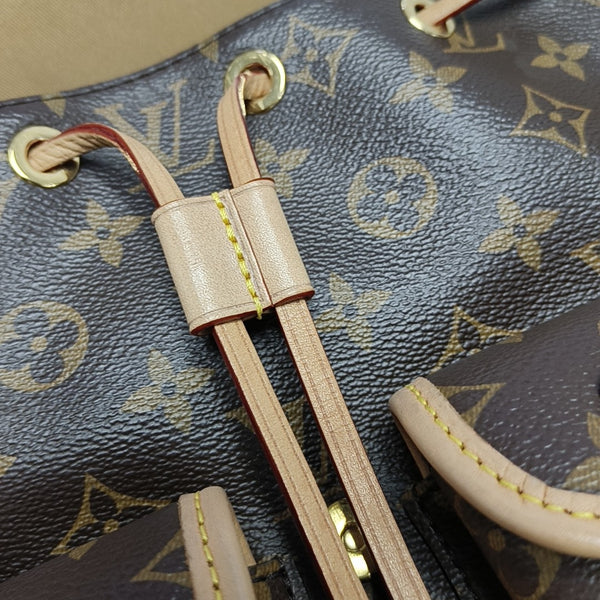 EXCURSION PM Monogram Coated Canvas Brown