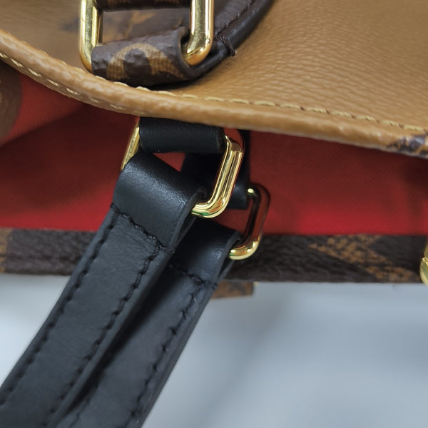 ONTHEGO MM Monogram Coated Canvas Brown