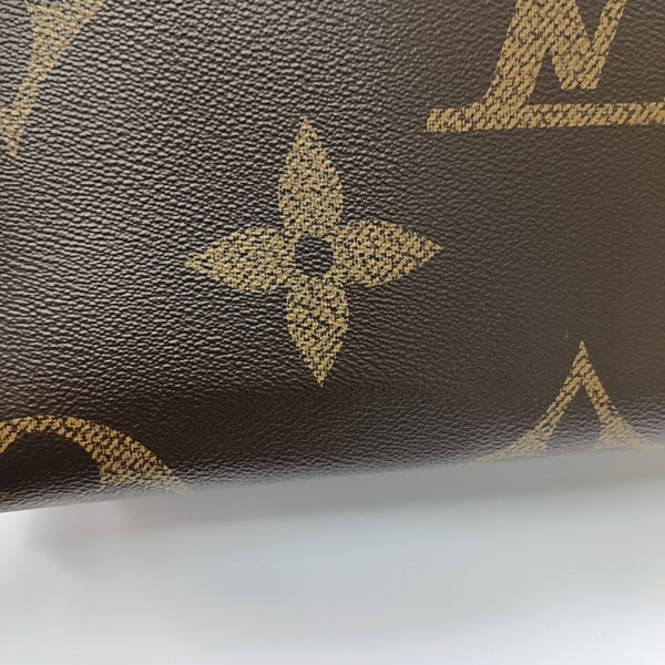 ONTHEGO MM Monogram Coated Canvas Brown