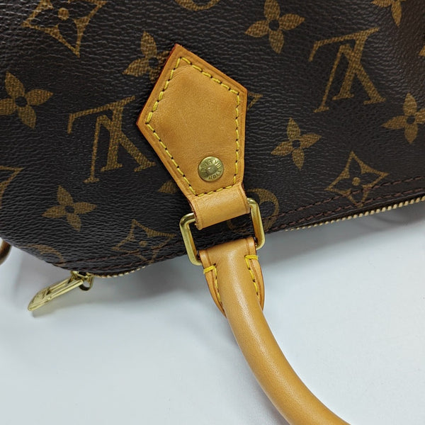SPEEDY 25 Monogram Coated Canvas Brown