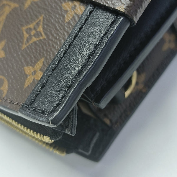 TRUNK Monogram Coated Canvas Brown