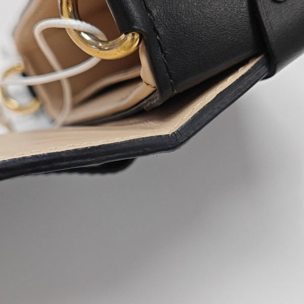 TRUNK Monogram Coated Canvas Brown