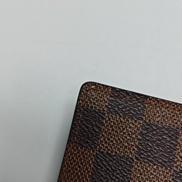 JAMES Damier Ebene Coated Canvas Brown