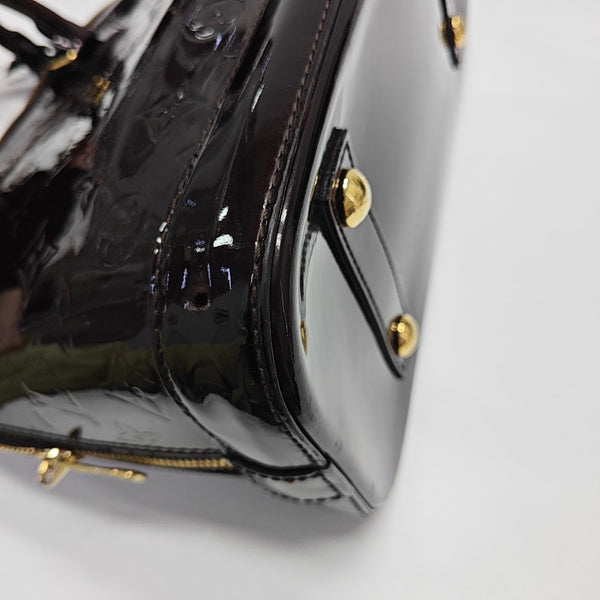 ALMA PM Monogram Patent Leather Brown