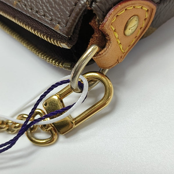 EVA Monogram Coated Canvas Brown