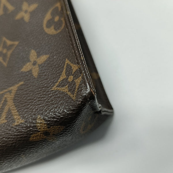 TOILET POCKET 26 Monogram Coated Canvas Brown