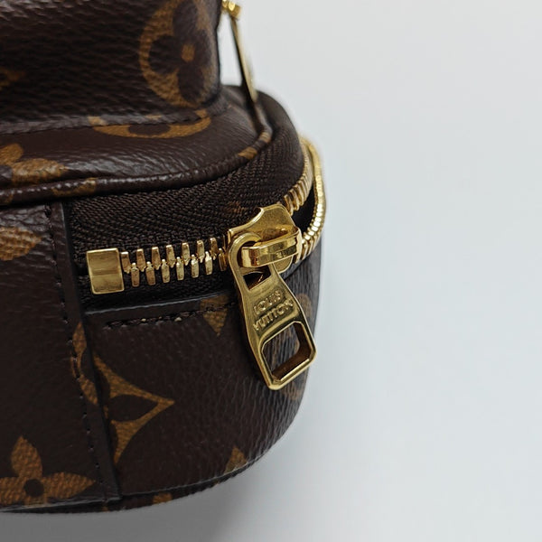 UTILITY Monogram Coated Canvas Brown