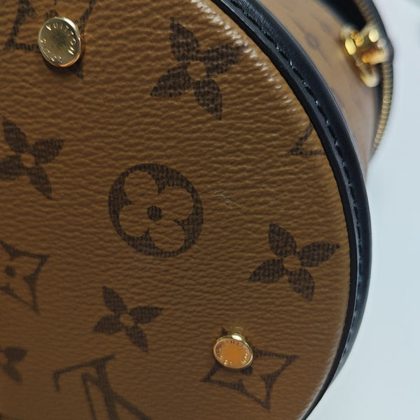 CANNES PM Monogram Coated Canvas Brown