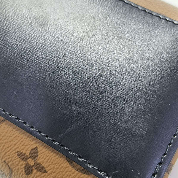 CANNES PM Monogram Coated Canvas Brown