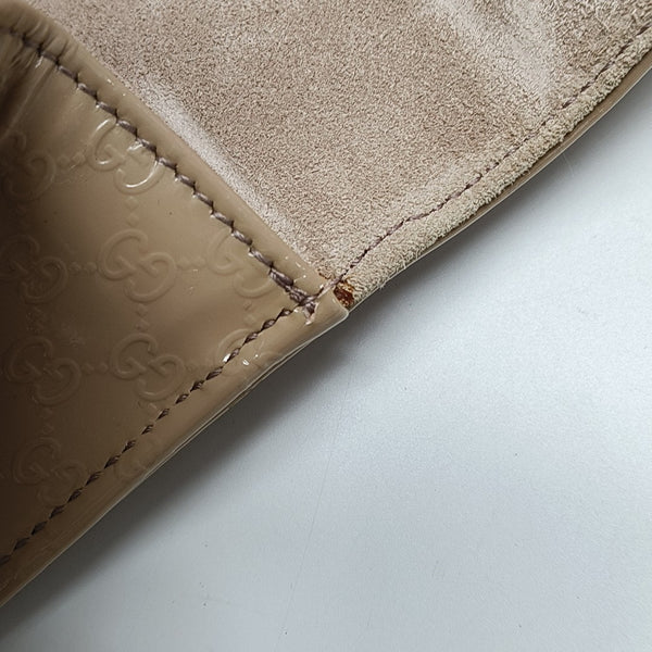 Monogram Calfskin Clutch Pink