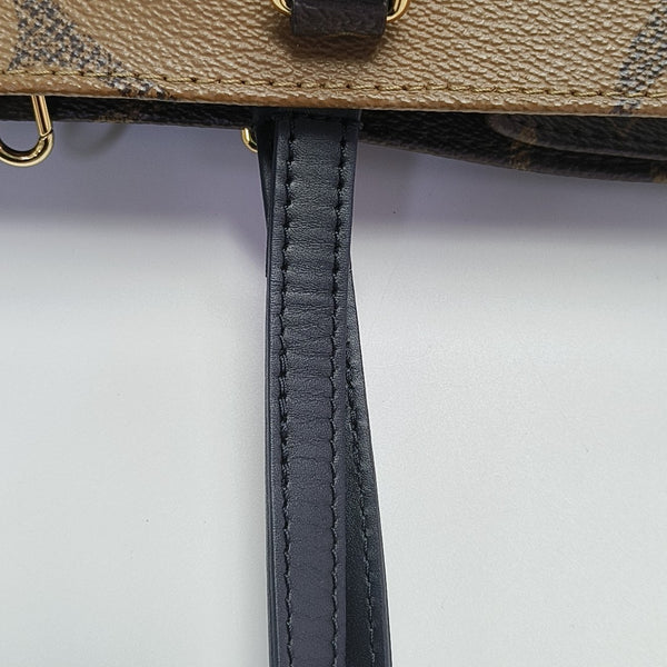 ONTHEGO MM Monogram Coated Canvas Brown