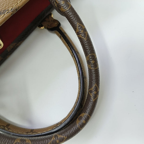 ONTHEGO PM Monogram Coated Canvas Brown