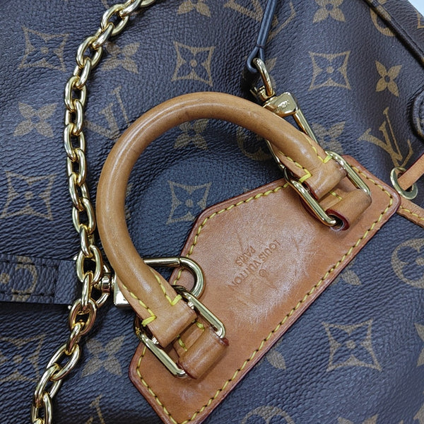 EXCURSION PM Monogram Coated Canvas Brown