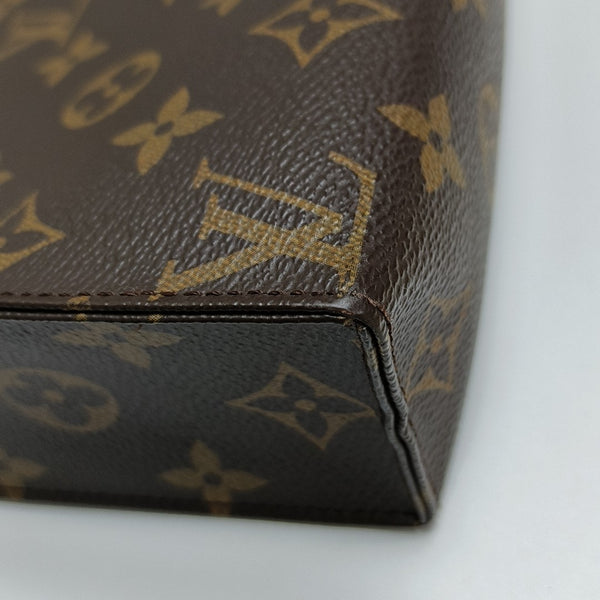 TOILET POCKET 19 Monogram Coated Canvas Brown